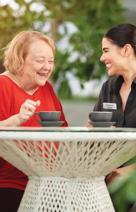 Arcare_Hero_tea_resident_w_staff_300dpi